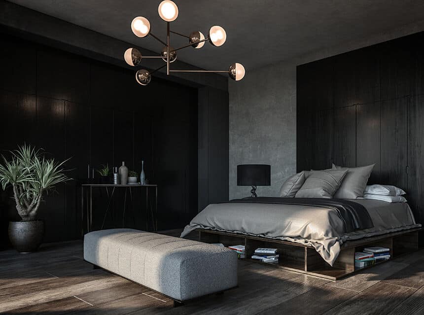 exclusive bedroom with black walls, double bed with light gray satin bedding and a gray pouf in front of the bed